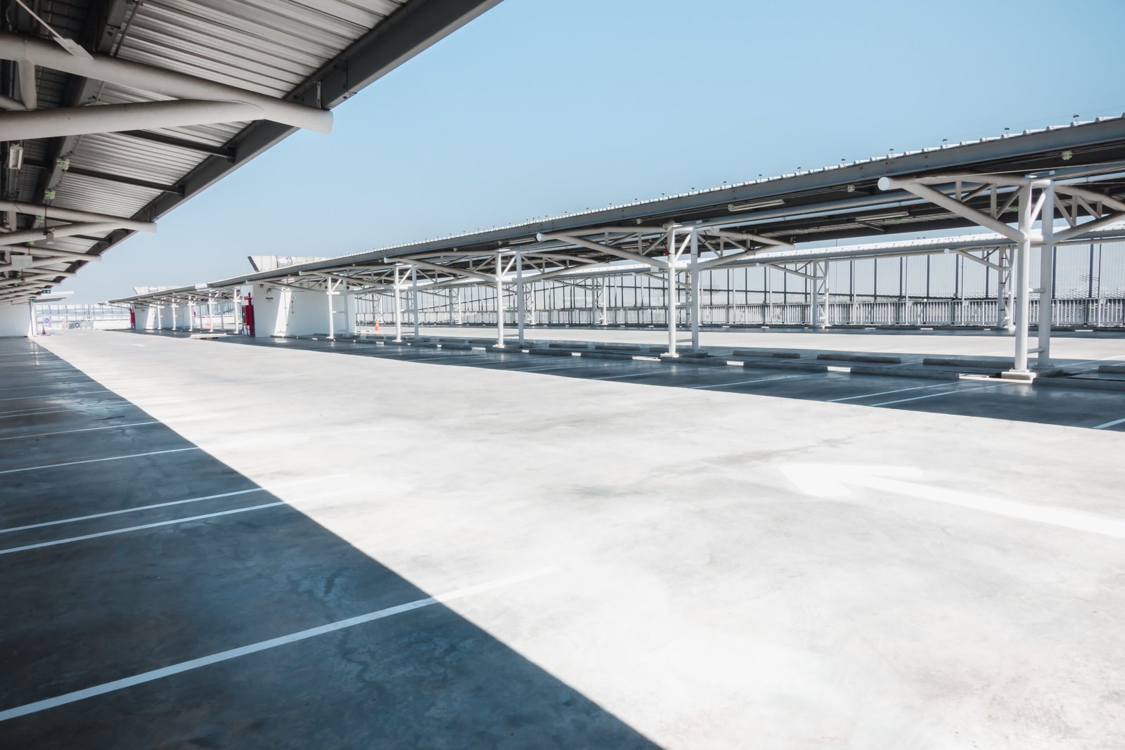 Car Parking Lot Area on Deck Floor of Shopping Mall, Perspective Car Parking Lot Area on Deck Floor of Shopping Mall, Perspective View Empty of Car Park Structure Building at Department Store. Auto Service Parking Lots